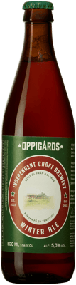 En glasflaska med Oppigårds Winter Ale, en ale från Sverige