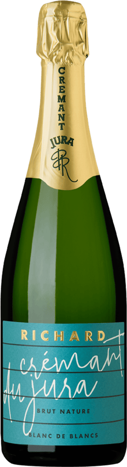 En glasflaska med Richard Crémant du Jura Brut Nature Blanc de blancs, en mousserande från Jura i Frankrike