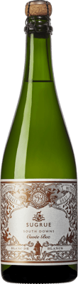 En glasflaska med Sugrue Cuvée Boz Blanc de Blancs 2015, en mousserande från Storbritannien