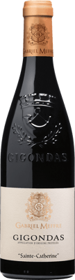 En glasflaska med Gabriel Meffre Gigondas Sainte Catherine, ett rött vin från Rhonedalen i Frankrike