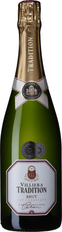 En glasflaska med Villiera Tradition Brut, ett mousserande vin från Sydafrika
