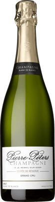 En glasflaska med Pierre-Péters Cuvée de Réserve, ett champagne från Champagne i Frankrike
