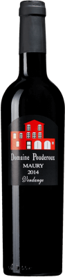 En glasflaska med Domaine Pouderoux, en starkvin från Languedoc-Roussillon i Frankrike
