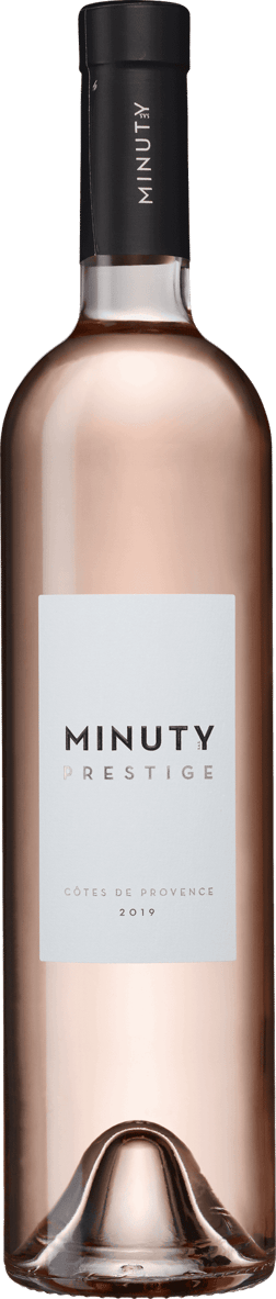 En glasflaska med Minuty Prestige Rosé 2024, en rosévin från Provence i Frankrike
