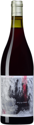 En glasflaska med Biologist Orange Blend Slava Ukraini, ett rött vin från Western Cape i Sydafrika