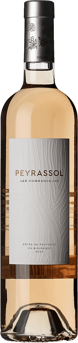 En glasflaska med Peyrassol Cuvée des Commandeurs Rosé 2023, en rosévin från Provence i Frankrike
