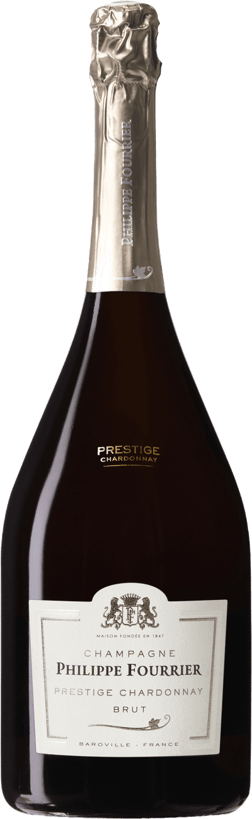 En glasflaska med Philippe Fourrier Prestige Blanc de Blancs, ett champagne från Champagne i Frankrike