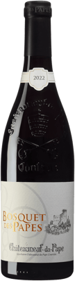 En glasflaska med Bosquet des Papes Châteauneuf, ett rött vin från Rhonedalen i Frankrike