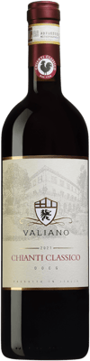 En glasflaska med Valiano Chianti Classico, ett rött vin från Toscana i Italien
