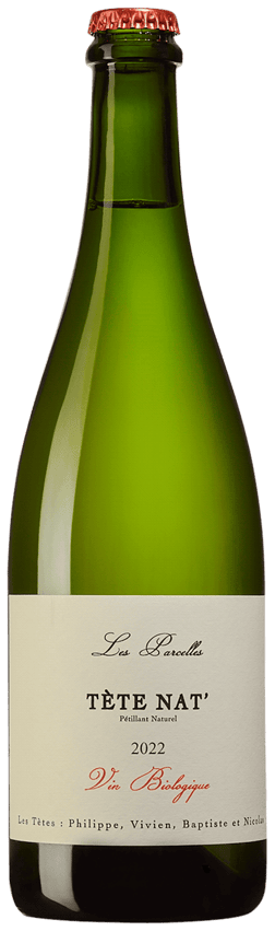 En glasflaska med Louis Roederer Starck Brut Nature 2015, ett mousserande vin från Frankrike