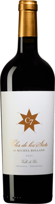 En glasflaska med Clos de los Siete, ett rött vin från Cuyo i Argentina